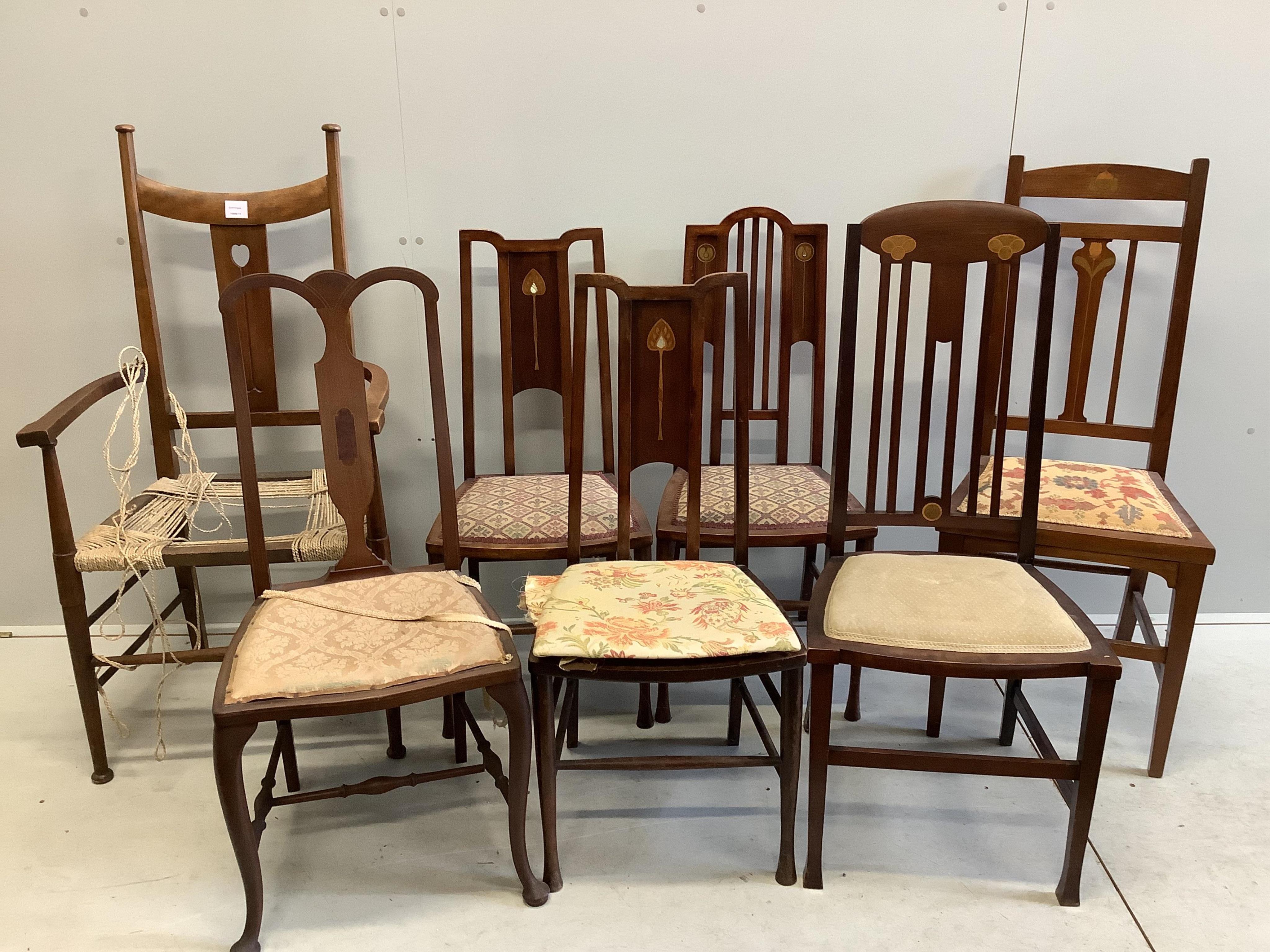 Seven Art Nouveau mahogany and beech dining chairs, three mother of pearl inlaid. Condition - poor to fair